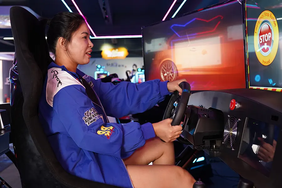 girl playing drive simulator