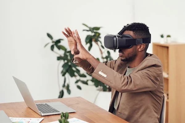 man playing with VR headset