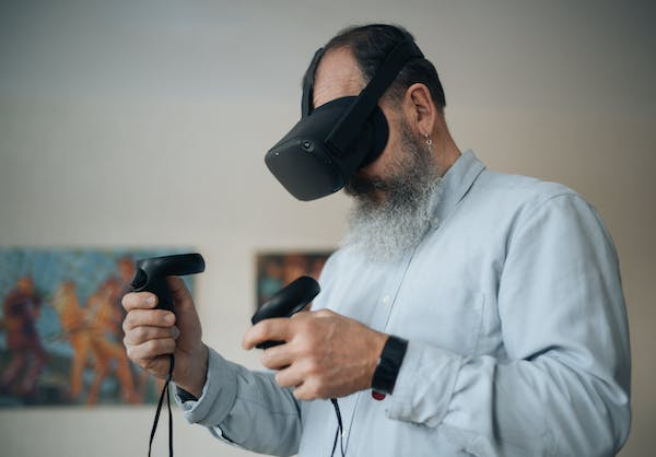 man playing with VR headset