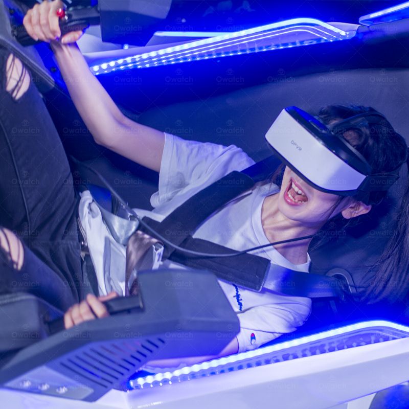 a girl enjoying the VR reality racing simulators